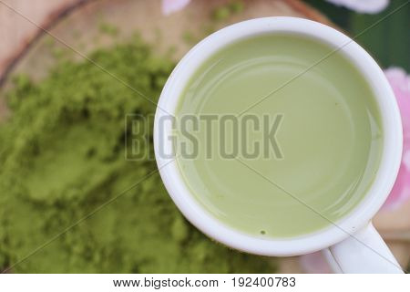 Hot green tea and matcha tea powde