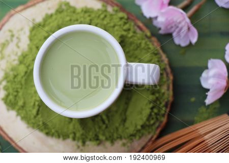 Hot green tea and matcha tea powde