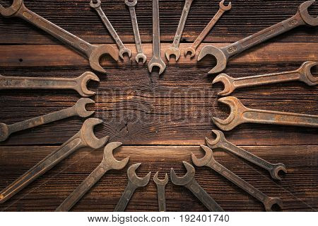 Heart from old wrench on rustic wooden table for international fathers day Dad is the best - Tools on a rustic wooden background