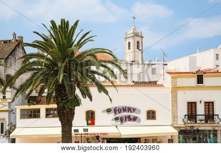 Shopping Street And Tower Of St Sebastian Church