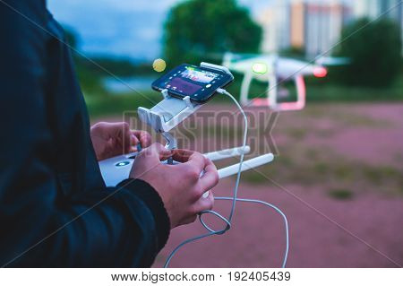 A process of launching the quadcopter drone with camera, operator pilot launches quadcopter uav, unmanned aerial vehicle flying
