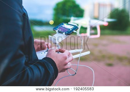 A process of launching the quadcopter drone with camera, operator pilot launches quadcopter uav, unmanned aerial vehicle flying