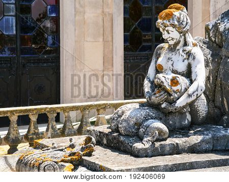 Statue On Fountain In Garden Of Estoi Palace