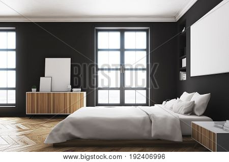 Side view of a modern luxury bedroom with black walls a large bed in the center of the room two bookcases by its sides a large window and a framed horizontal poster. 3d rendering mock up