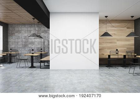 Wooden and dark gray wall cafe interior with a large white wall fragment in the center and old oil lamps on square wooden tables. 3d rendering mock up