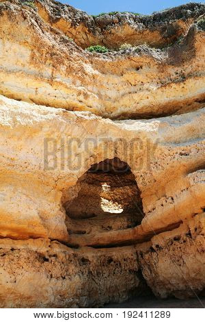 Cave In Eroded Sandstone Rock Near Albufeira