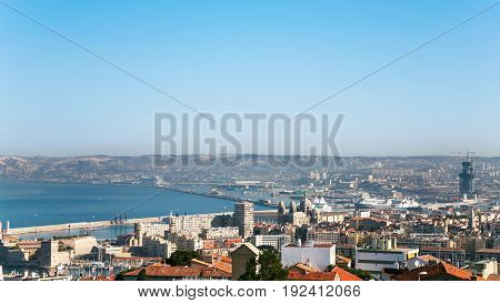 View Of Marseilles City And Port Under Blue Sky