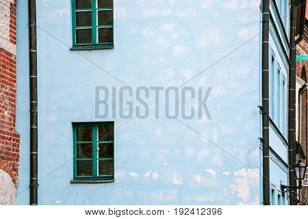 Blue Facade Of Old House On Street In Riga City