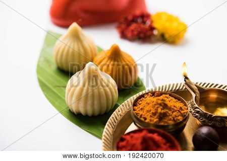 A modak is an Indian sweet dumpling popular in many parts of India. It is called modak in Marathi and Konkani as well as Gujarati language, Kozhakkatta in Malayalam, modhaka or kadubu in Kannada