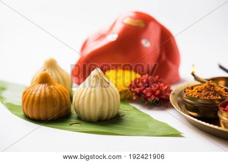 A modak is an Indian sweet dumpling popular in many parts of India. It is called modak in Marathi and Konkani as well as Gujarati language, Kozhakkatta in Malayalam, modhaka or kadubu in Kannada