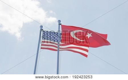 USA and Turkey, two flags waving against blue sky. 3d illustration