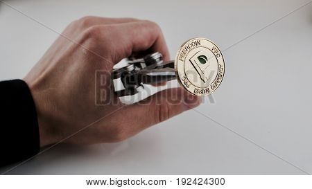 Gold Peercoin In Hand
