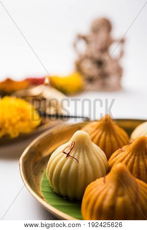 A modak is an Indian sweet dumpling popular in many parts of India. It is called modak in Marathi and Konkani as well as Gujarati language, Kozhakkatta in Malayalam, modhaka or kadubu in Kannada