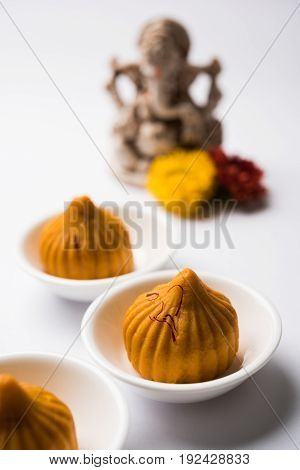 A modak is an Indian sweet dumpling popular in many parts of India. It is called modak in Marathi and Konkani as well as Gujarati language, Kozhakkatta in Malayalam, modhaka or kadubu in Kannada