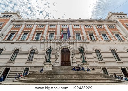 ROME ITALY - JUNE 1 2017: Palazzo Montecitorio building of the italien Parliament on Piazza del Parlamento. People on stairs.