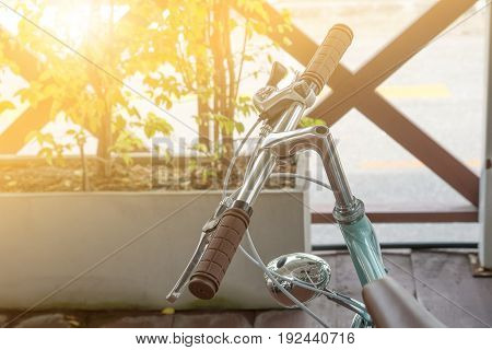 Handlebar of a bicycle on natural bokeh background. Travel and exercise concept