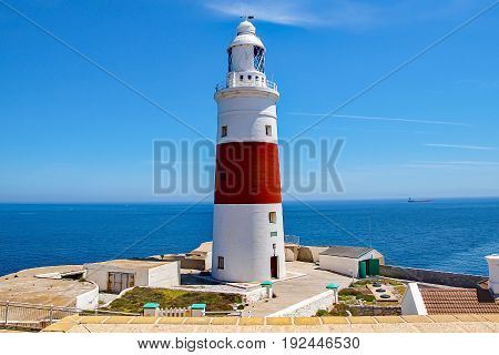 Gibraltar lighthouse on the Mediterranean sea off the coast