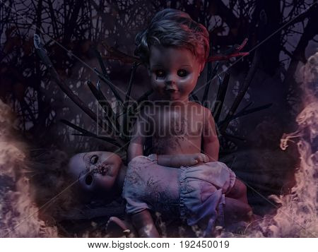 Two burning dirty creepy dolls sitting and lying on tree branches photo.