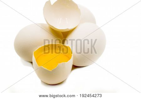 fresh eggs with yellow yalk on the black background