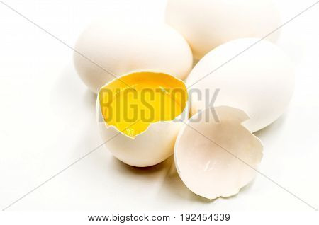 fresh eggs with yellow yalk on the black background