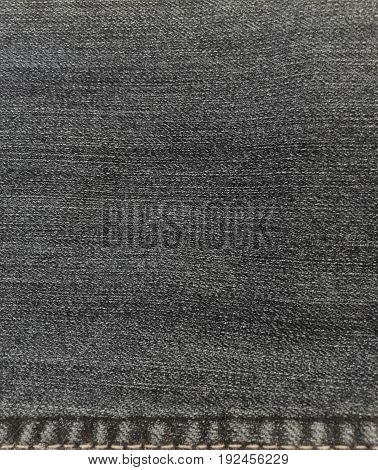 Texture of  black jean for background and wall