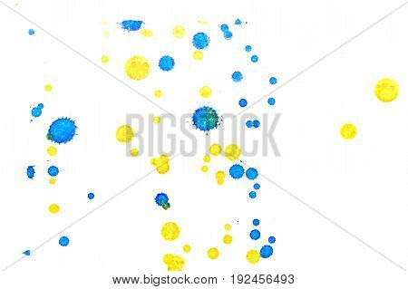 Abstract two-color yellow blue ink splash. Ink blots. Elements of design. The water-soluble ink on white paper Leste. Abstractionism