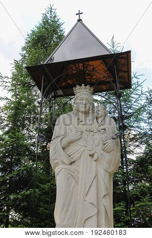 Schodnica Ukraine - July 03 2014: Statue of Virgin Mary Mother of God in Carpathians
