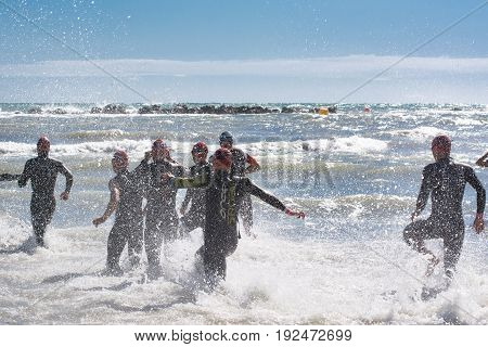 Pescara Italy - June 18 2017: Starting for the swimming test of the athletes of the Ironman 70.3 Pescara of June 18 2017