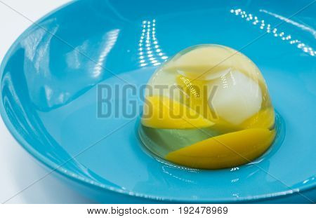 fruit various jelly mix on a blue plate