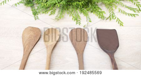 wood spoon wood Turner on white wood background