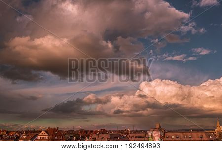 big clouds above an urban German city