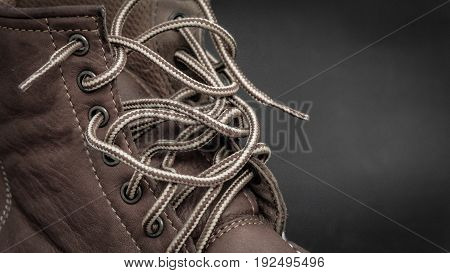 shoelace of brown leather shoes in studio