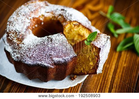 Sweet big honey cake on a white plate