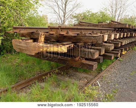 Wagon With Extracted Old Railways. Concrete And Wooden Sleepers With Rail Rods