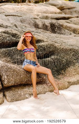 Beautiful Woman On Big Stone In Tropics.