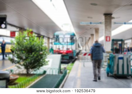 Blurred image bokeh of Train at the platform in Firenze Santa Maria Novella railway station in Florence Italy.