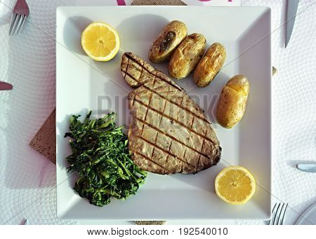 Tuna Steak With Batatas A Murro And Broccoli