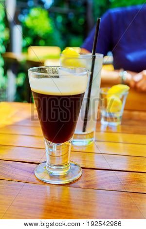Latte Coffee or caffe latte in tall latte glasses with table settings Latte coffee