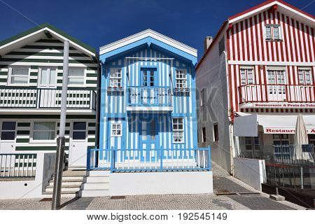 Costa Nova Portugal - June 10 2017: Famous resort on the Atlantic coast in Beira Litoral Portugal. Popular tourist destination to spend vacation time