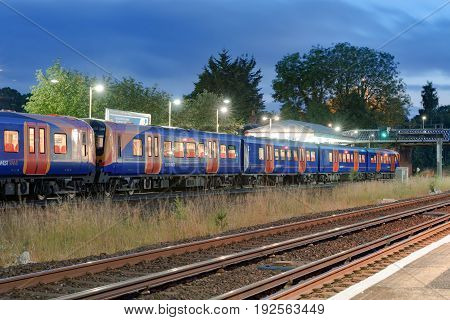 Hook, UK. 24th June 2017. A South West Trains class 450 Desiro EMU train is at Hook station awaiting departure to Basingstoke.