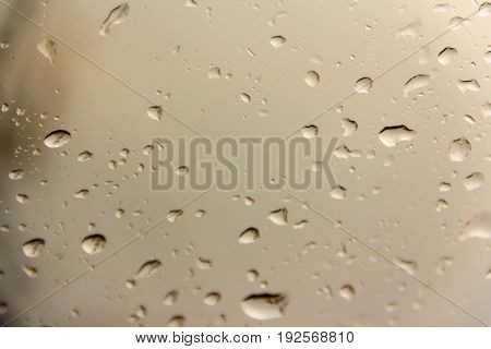 Rain Drop on colorful glass of background