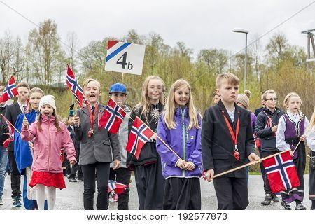 VERDAL NORWAY - MAY 17 2017: National day in Norway. Norwegians at traditional celebration and parade on may 17 2017 in Verdal. People on parde before school in Verdal. Constitution Day is the National Day of Norway.