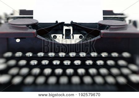 Blank paper in typewriter machine - detail