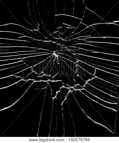 Detail of the shattered glass - cracks and shards -hit glass