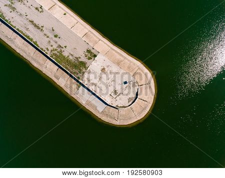 Aerial view breakwater at sea, cutwater, pier, groyne mole