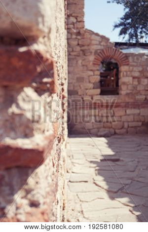 Historical ruins in the old town of Nessebar Bulgaria selective focus