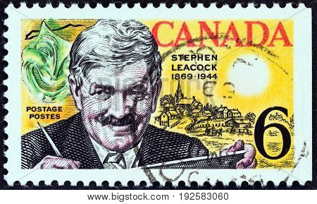 CANADA - CIRCA 1969: A stamp printed in Canada issued for the birth centenary of humorist Stephen Butler Leacock shows Stephen Butler Leacock, Mask and Mariposa, circa 1969.