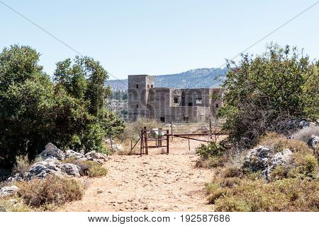 Ruins of the building of the British police station in Ein Tin at the beginning of the descent to the Amud River in Israel