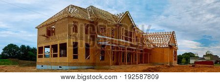 unfinished wood frame building or a house