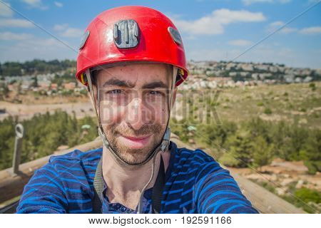 Extreme Professional Climber Taking Selfie Photo On The Top Of Climbing Tower